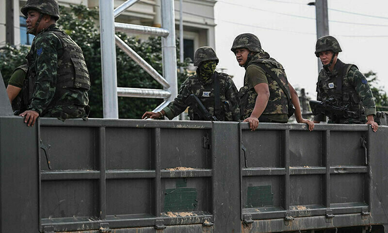 Royal Thai Army soldiers are transported in an army truck in the Thai border province of Si Sa Ket on July 26. &mdash; AFP