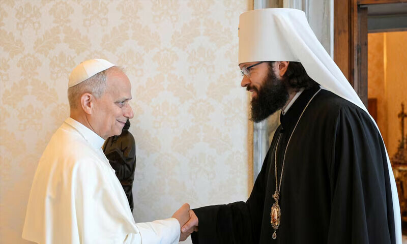 Pope Leo shakes hands with Metropolitan Antonij of Volokolamsk, at the Vatican July 26, 2025. &mdash; Reuters