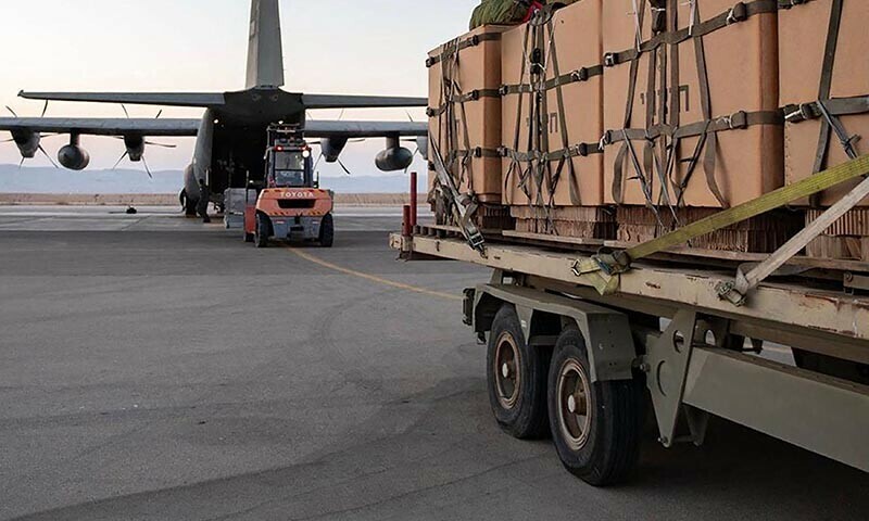 A handout picture released by the Israeli army on July 27, 2025, shows aid parcels ready to be loaded onto an Israeli military aircraft before flying over the Gaza Strip for an airdropping operation. — AFP