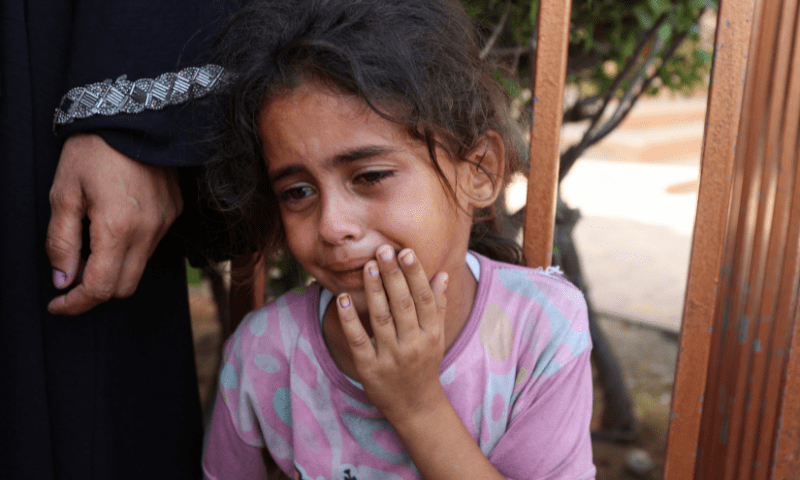 A child reacts during the funeral of Palestinians killed in an overnight Israeli strike, according to medics, at Nasser hospital, in Khan Younis in the southern Gaza Strip on July 28, 2025. &mdash; Reuters 