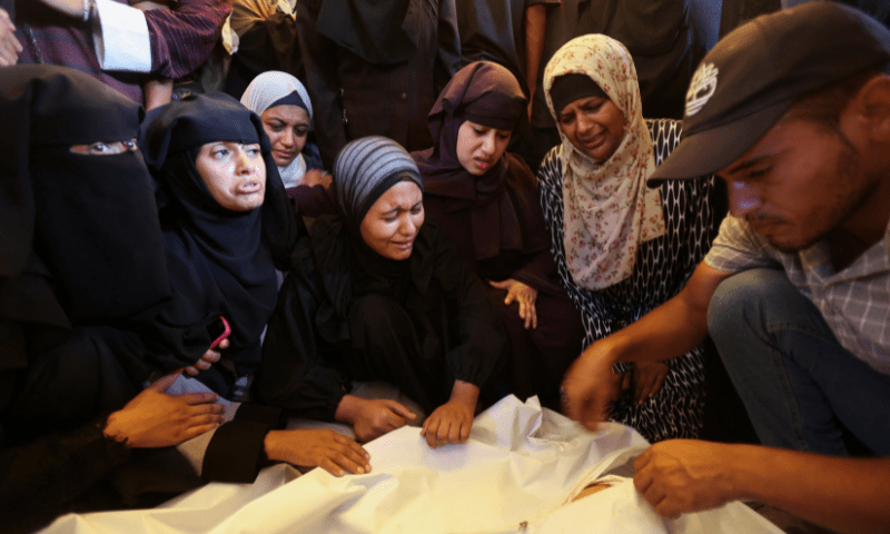 Mourners react during the funeral of Palestinians killed in an overnight Israeli strike, according to medics, at Nasser hospital, in Khan Younis in the southern Gaza Strip on July 28, 2025. — Reuters