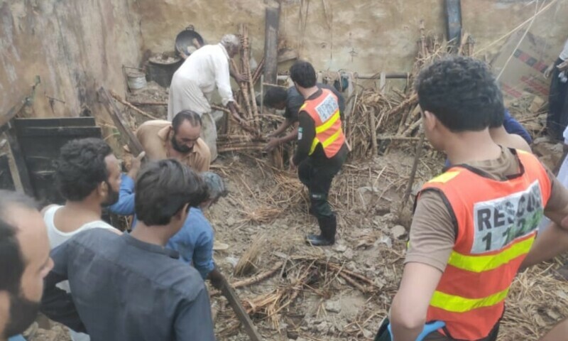 Rescue 1122 team clearing debris in the aftermath of a roof collapse in Lakki Marwat on July 31. &mdash; via Zahid Imdad