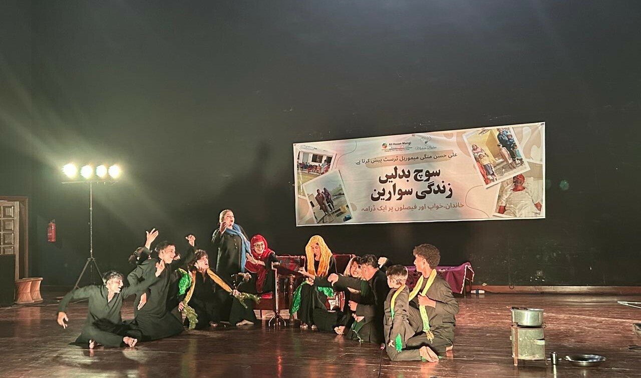  Actors portray a child marriage scene during the stage performance. Photo: Author 