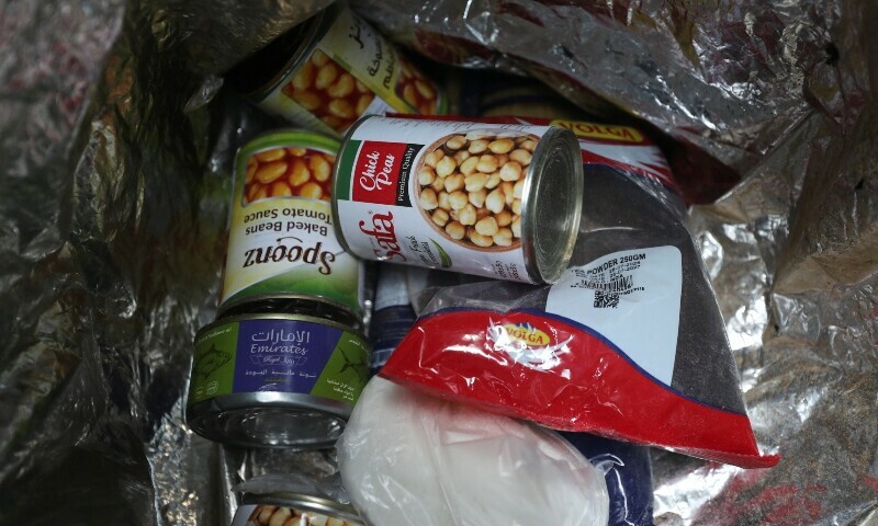 Contents of an airdropped food parcel received by Fares Zaher, a Palestinian father of eight, are pictured in Gaza City, July 28. &mdash; Reuters