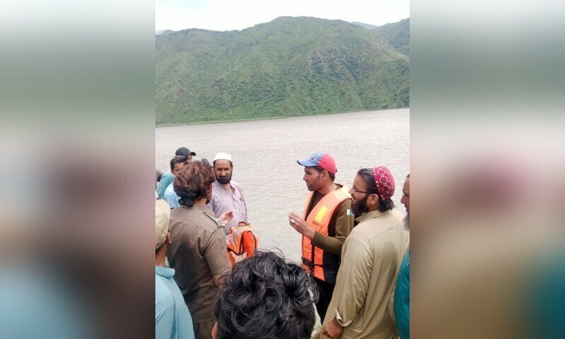 Rescue officials at the site of the drowning in Kamach area of Khyber Pakhtunkhwa’s Shangla district on July 31. — Rescue 1122