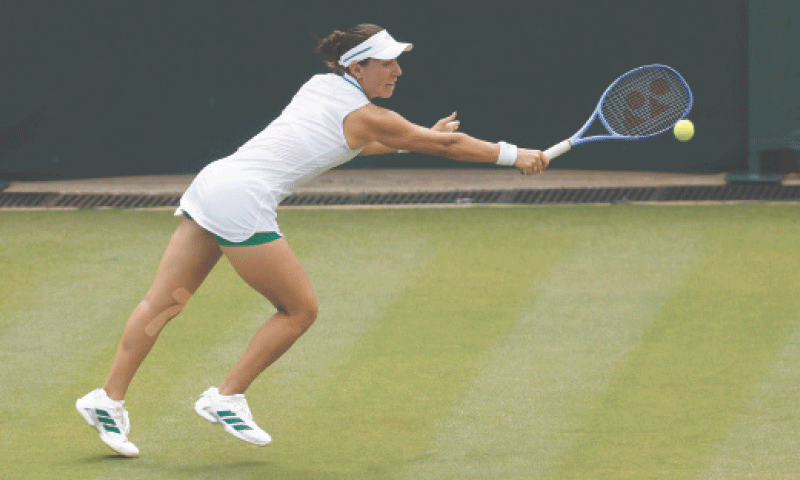 JESSICA Pegula of the US hits a return against Italy’s Elisabetta Cocciaretto during their Wimbledon first-round match at the 
All England Lawn Tennis and Croquet Club on Tuesday.—Reuters