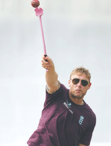 ENGLAND Lions coach Andrew Flintoff throws a ball during a practice session at Edgbaston on Tuesday.—Reuters