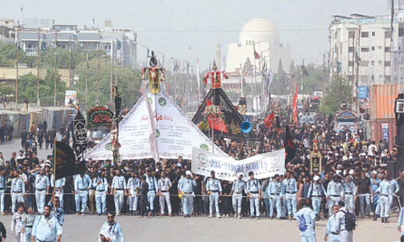 The main 9th Muharram procession passes through M.A. Jinnah Road.—Shakil Adil / White Star