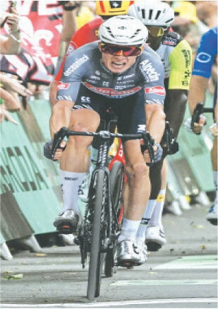Alpecin-Deceuninck team&rsquo;s Jasper Philipsen of Belgium cycles to the finish line to win the first stage of the Tour de France on Saturday.&mdash;AFP