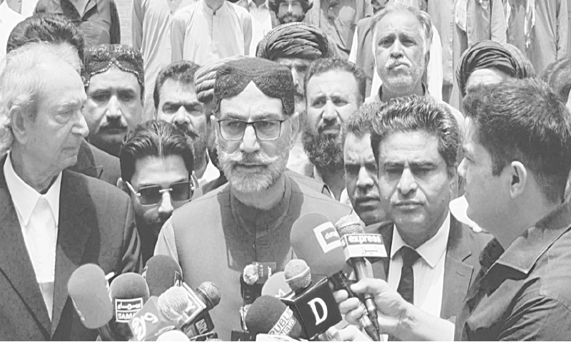 HAJI Lashkari Raisani talks to reporters at the Balochistan High Court in Quetta.—PPI