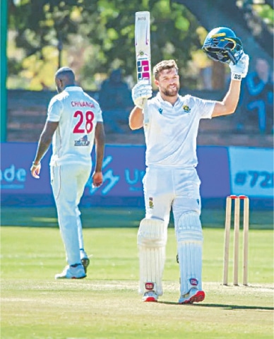 SOUTH AFRICAN captain Wiaan Mulder celebrates after completing his triple century during the second Test against Zimbabwe at the Queens Sports Club on Monday.—courtesy Zimbabwe Cricket