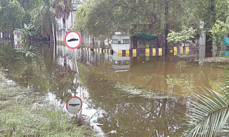 Rainwater floods a road in Diplomatic Avenue on Tuesday. — White Star