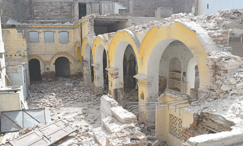 THE decades-old building in Hyderabad has been partially demolished.—Photo by Umair Ali