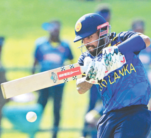 SRI LANKAN batter Kusal Mendis plays a shot during the third ODI against Bangladesh at the Pallekele International Cricket Stadium on Tuesday.—AFP
