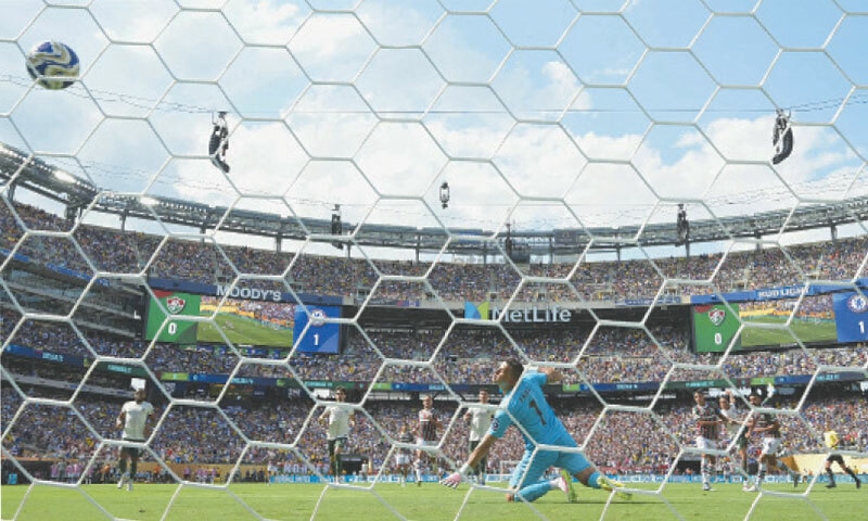 EAST RUTHERFORD: Fluminense goalkeeper Fabio fails to save a shot by Chelsea’s Joao Pedro (second R) during their Club World Cup semi-final at the MetLife Stadium.—AFP