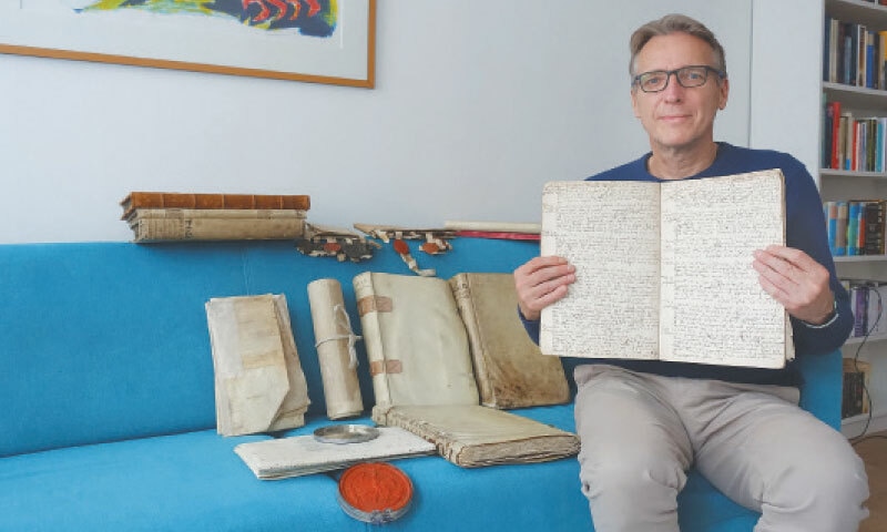 DUTCH art detective Arthur Brand with recovered documents in Amsterdam.—AFP
