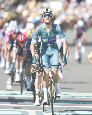 LIDL-TREK’S Italian rider Jonathan Milan celebrates after winning the Tour de France stage eight, a 171.4km distance from Saint-Meen-le-Grand to Laval Espace Mayenne, on Saturday.
—Reuters