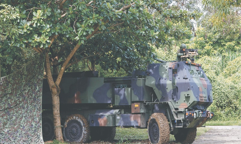 A High Mobility Artillery Rocket System is on display at a park in Taichung on Saturday.—Reuters