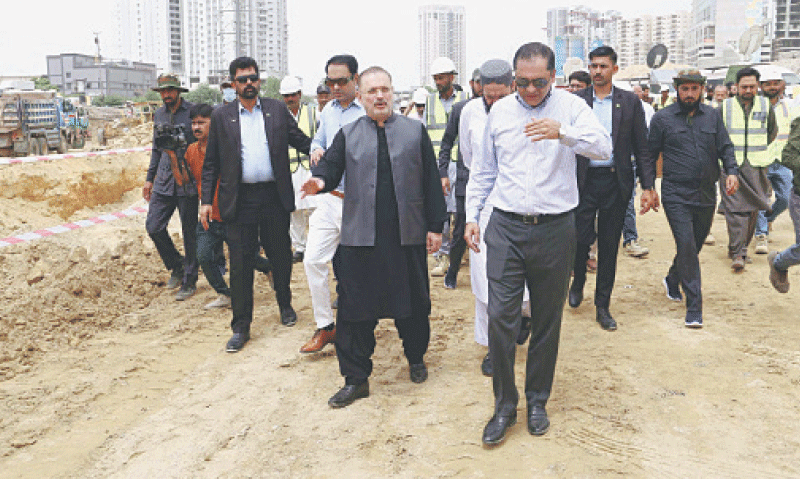 Sharjeel Memon visits the Jam Sadiq Bridge alongside others.—PPI
