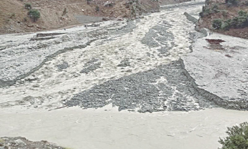 The destroyed bridge and road in Upper Kohistan on Wednesday. &mdash; Dawn