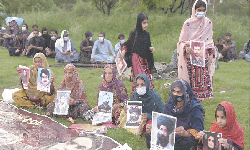 Baloch Yakjehti Committee supporters protest outside the National Press Club.—Tanveer Shahzad / White Star