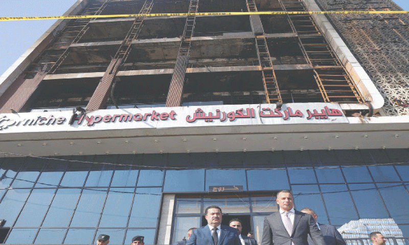 IRAQI Prime Minister Mohammed Shia al Sudani visits the shopping centre after the tragedy.—Reuters