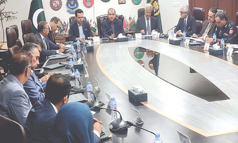 Interior Minister Mohsin Naqvi chairs a meeting on Friday.—PPI
