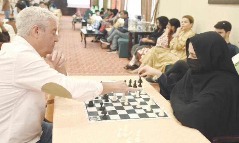 Portuguese Ambassador Frederico Da Sillva plays chess with Rumaysa Batool on the first Portugal-Pakistan Chess Tournament held in collaboration with the Portuguese embassy and the Chess Federation of Pakistan in Islamabad on Saturday. — Photo by Tanveer Shahzad Portuguese Ambassador Frederico Da Sillva plays chess with Rumaysa Batool on the first Portugal-Pakistan Chess Tournament held in collaboration with the Portuguese embassy and the Chess Federation of Pakistan in Islamabad on Saturday. — Photo by Tanveer Shahzad