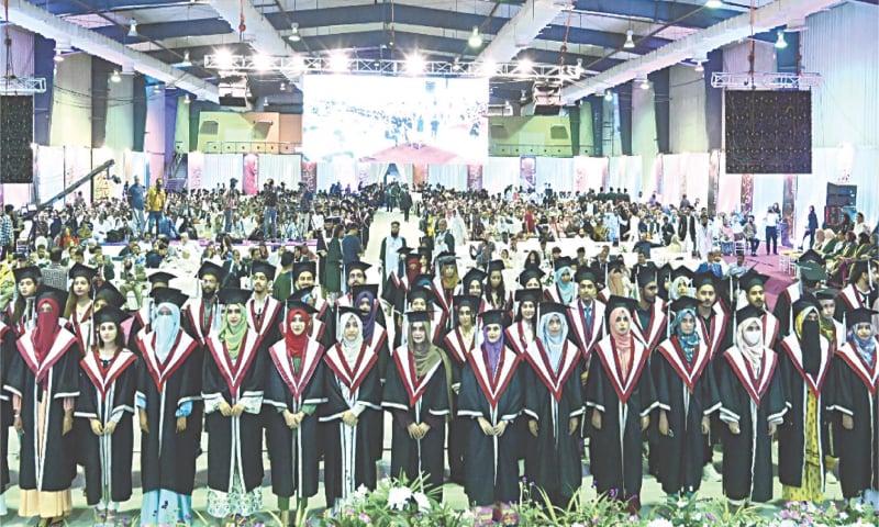 Students line up to get their degrees at the convocation.&mdash;Dawn