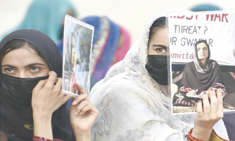 families of Baloch missing persons hold a sit in Islamabad on Saturday.—Tanveer Shahzad