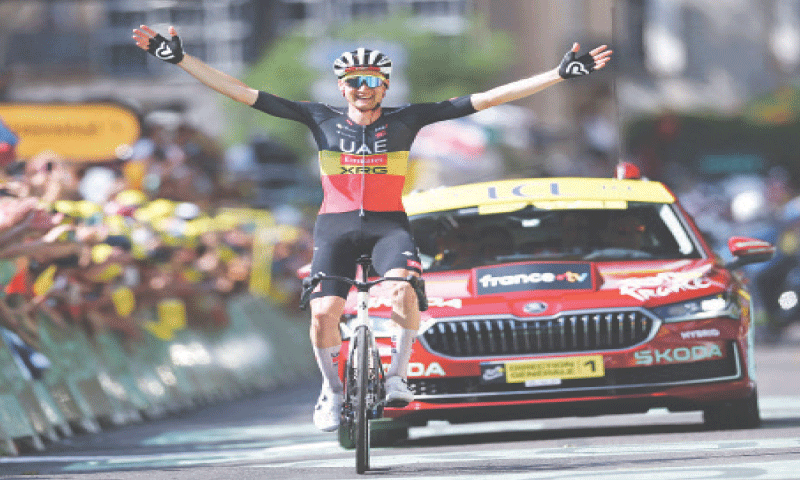 UAE TEAM Emirates XRG&rsquo;s Tim Wellens celebrates as he crosses the finish line to win the 15th stage of the Tour de France on Sunday.&mdash;AFP
