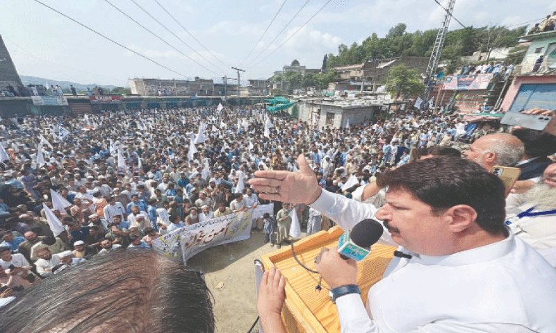 Special assistant to chief minister Malik Liaqat addresses a peace rally in Maidan tehsil, Lower Dir, on Sunday. &mdash; Dawn