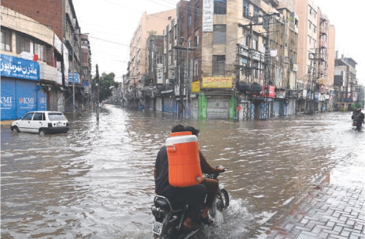 Beadon Road flooded with rainwater after Wednesday morning downpour. &mdash; White Star