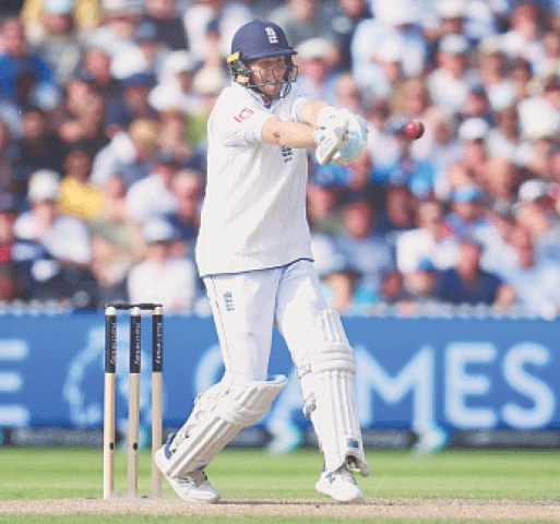 ENGLAND batter Joe Root pulls during his century in the fourth Test against India at Old Trafford on Friday. — Reuters