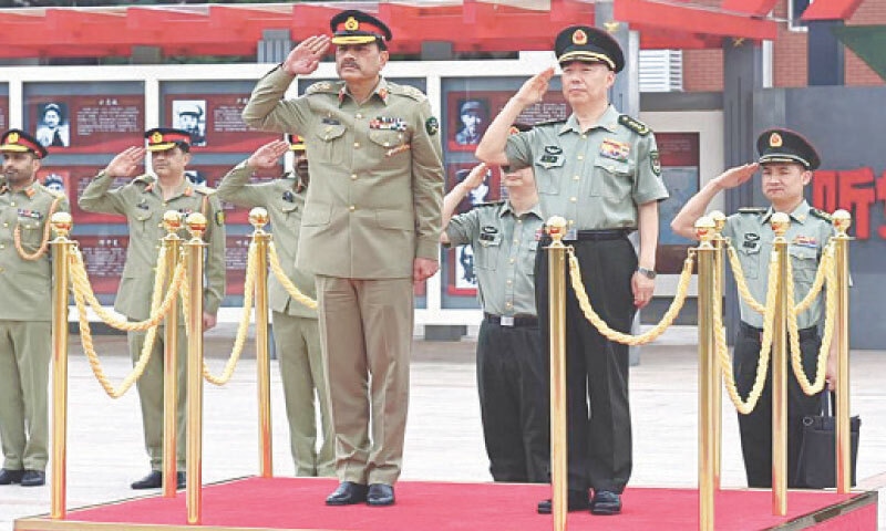 ARMY Chief Field Marshal Asim Munir receives a guard of honour upon his arrival at PLA headquarters.—Online
