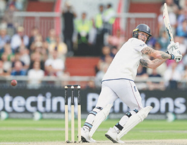  MANCHESTER: England captain Ben Stokes plays a shot to complete his century during the fourth Test against India at Old Trafford on Saturday.—AFP 