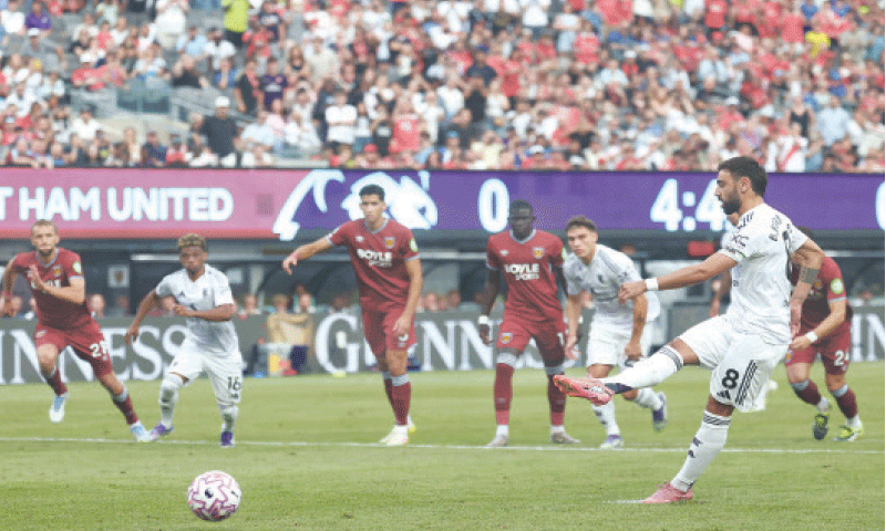 EAST RUTHERFORD (New Jersey): Manchester United&rsquo;s Bruno Fernandes shoots to score from the penalty spot during the pre-season friendly against West Ham United at the MetLife Stadium.&mdash;AFP