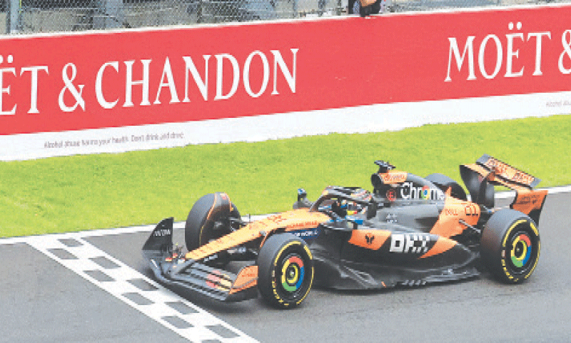 MCLAREN&rsquo;S Oscar Piastri passes the chequered flag to 
win the Formula One Belgian Grand Prix at Circuit de Spa-Francorchamps on Sunday.&mdash;Reuters