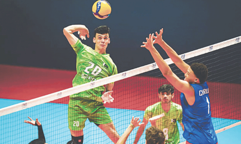 PLAYERS of Pakistan and Puerto Rico compete during their U-19 World Volleyball Championship match on Monday.—Courtesy PVF