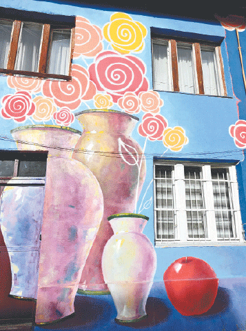 THE facades of old buildings renovated with murals by Bosnian street artist Benjamin Cengic in Sarajevo.&mdash;AFP