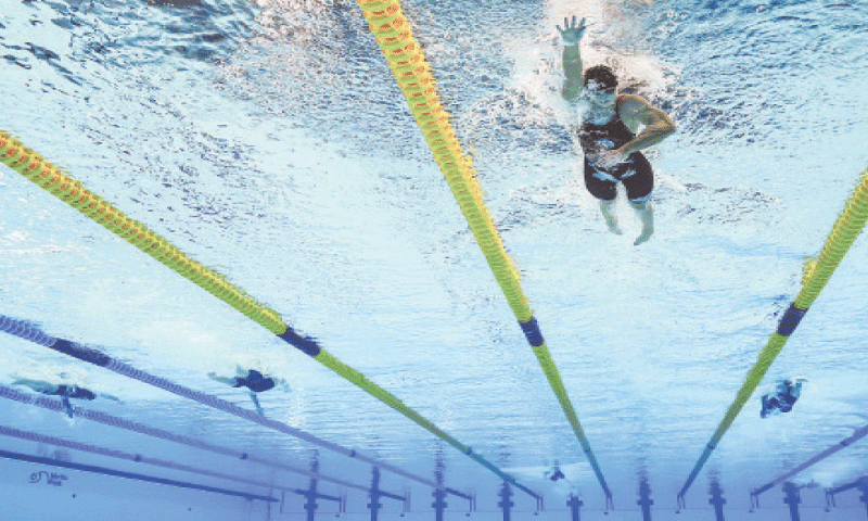 KATIE Ledecky (second R) of the US leads the 1500m freestyle final during the World Aquatics Championships at the World Aquatics Championships Arena on Tuesday.—Reuters