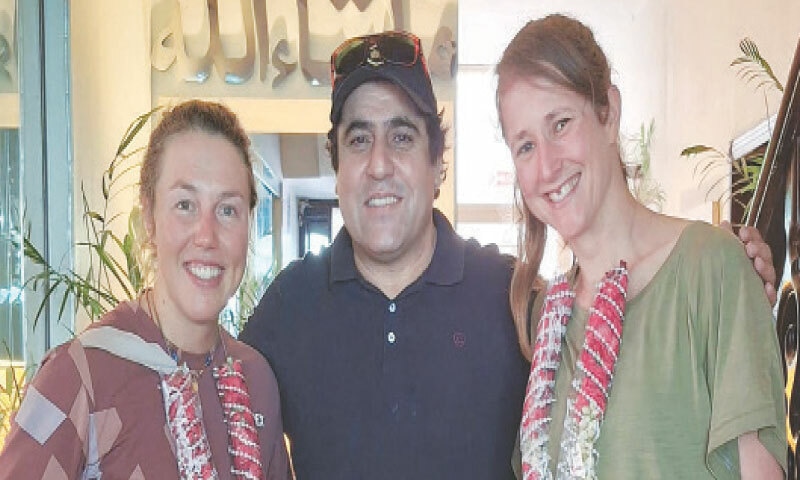 German mountaineer Laura Dahlmeier (L) poses with Marina Eva (R) and tour operator Iqbal Shigri.—AFP/file