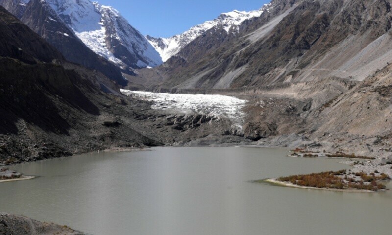 The Gamoo Bhr glacial lake pools in front of the Darkut glacier in Darkut village, Yasin valley, in the Gilgit-Baltistan region of Pakistan, October 11, 2023. —Reuters /Akhtar Soomro