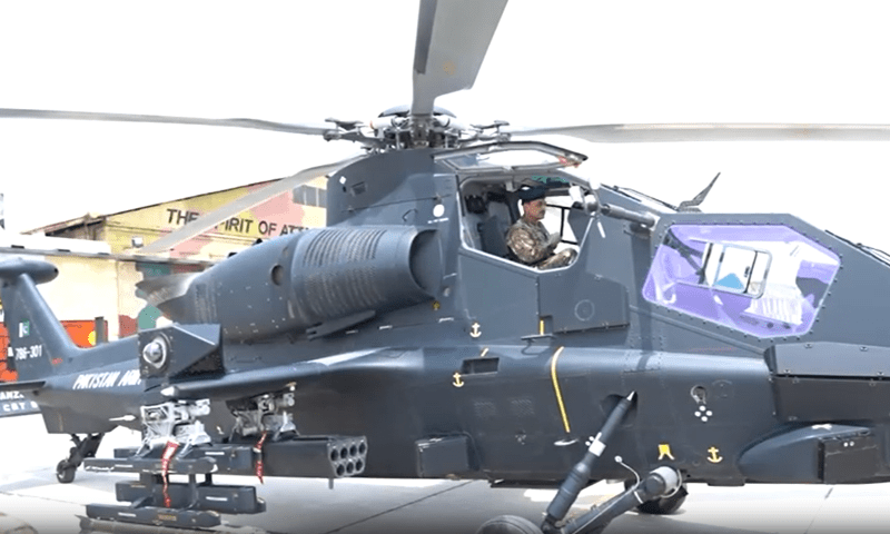 COAS Field Marshal Asim Munir sits inside a helicopter at the induction ceremony of Z-10ME attack helicopters. &mdash; screengrab via Radio Pakistan