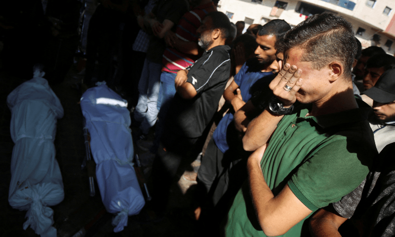 Mourners react during the funeral of Palestinians, who were killed by Israeli fire while trying to receive aid on Friday, according to medics, at Al-Shifa Hospital, in Gaza City on August 2, 2025. — Reuters