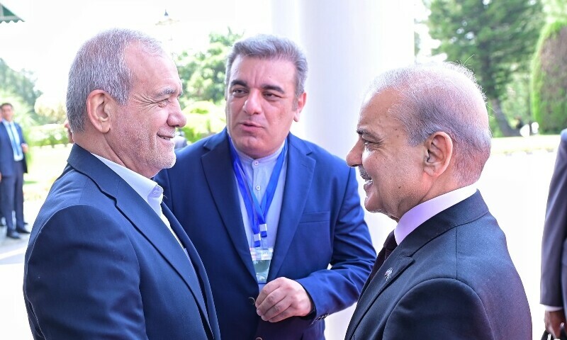Iranian President Masoud Pezeshkian (L) is received by Prime Minister Shehbaz Sharif (R) at PM house in Islamabad on August 3. — X/@GovtofPakistan Iranian President Masoud Pezeshkian (L) is received by Prime Minister Shehbaz Sharif (R) at PM house in Islamabad on August 3. — X/@GovtofPakistan