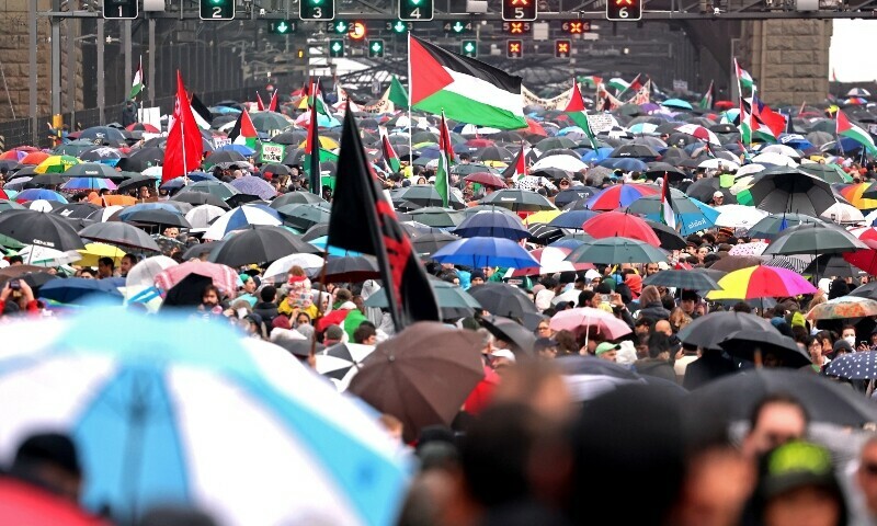 Demonstrators march across the Sydney Harbour Bridge during a pro-Palestinian rally against Israel&rsquo;s actions and the ongoing food shortages in the Gaza Strip, in Sydney on August 3. &mdash; AFP