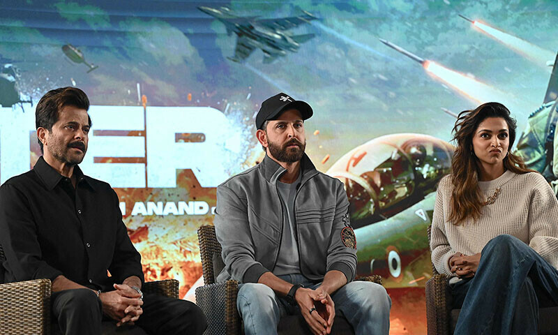 Bollywood actors Anil Kapoor (L), Hrithik Roshan (C) and Deepika Padukone (R) attend a promotional event for their Indian Hindi-language action film <em>Fighter</em> in Mumbai in January 2024. — AFP/File