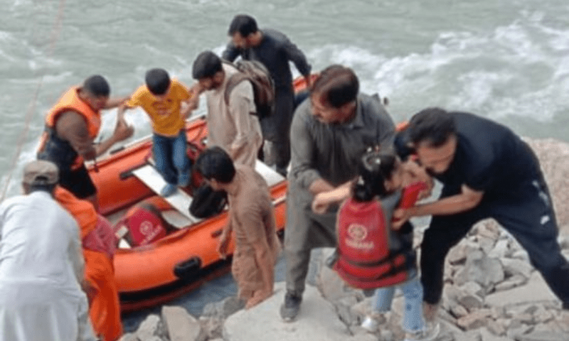 Family stranded due to floods in Gilgit-Baltistan being rescued. &mdash; Photo provided by Rescue 1122 Ghizer