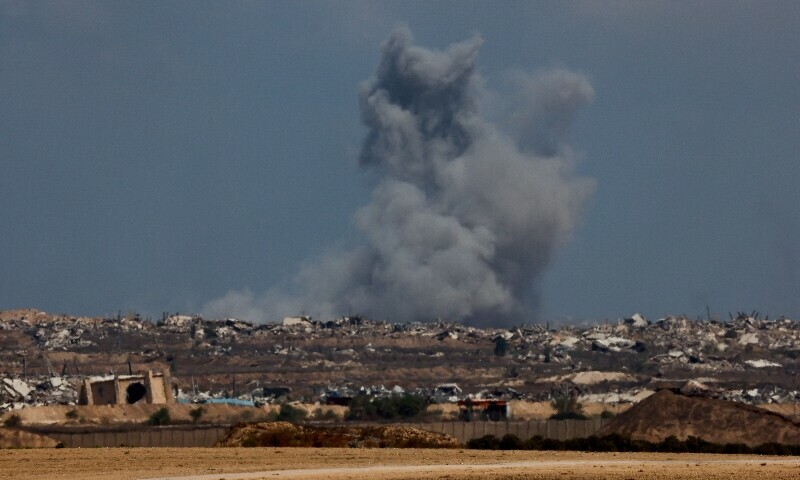 Smoke rises following an explosion in Gaza, as seen from Israel on August 5. &mdash; Reuters